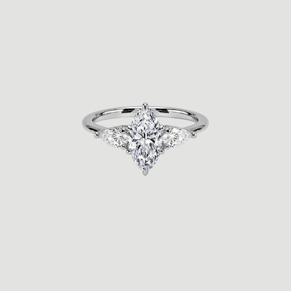 Pear And Marquise Shape Moissanite Three Stone Ring