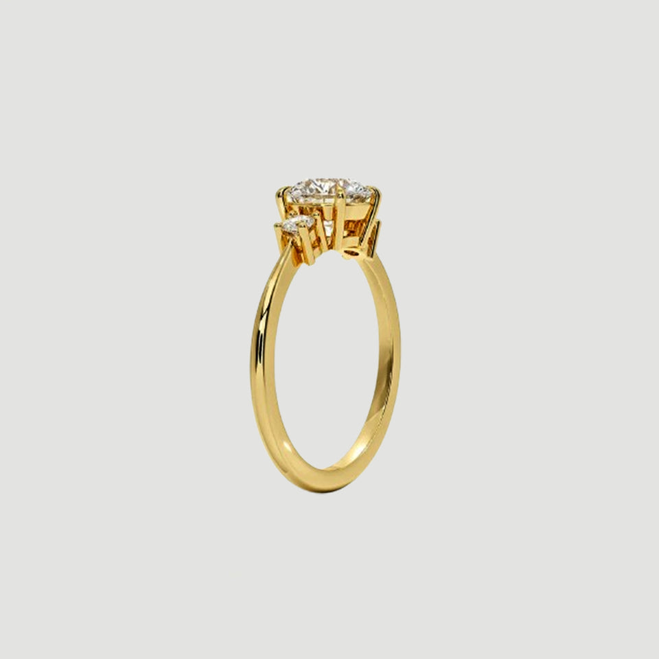 Round Moissanite Three Stone Engagement Ring