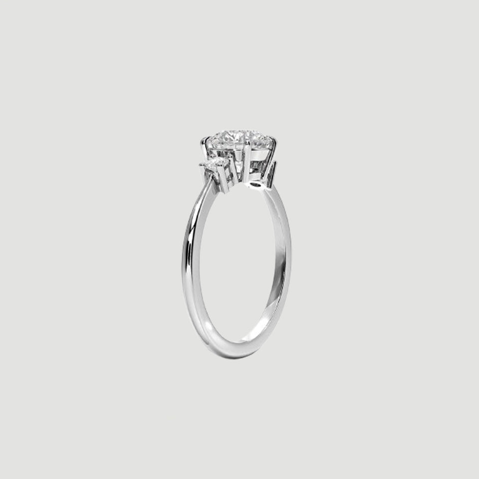 Round Moissanite Three Stone Engagement Ring